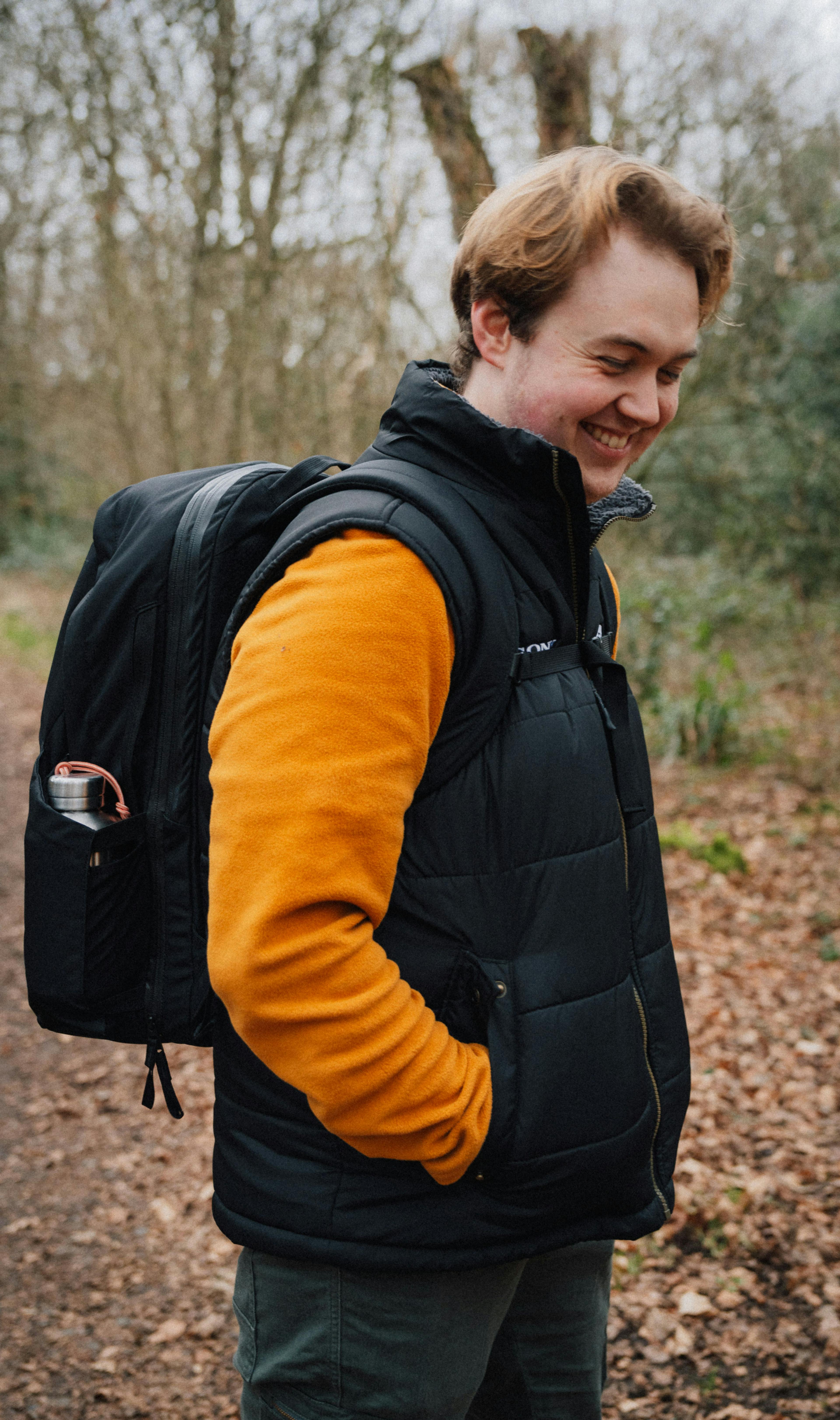 The Everything Backpack on a smiling man in the UK.